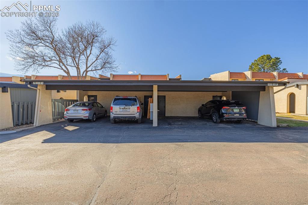 1018 Fontmore Road, Unit C Colorado Springs, CO 80904 - Photo 18 of 29 Garage featuring covered parking