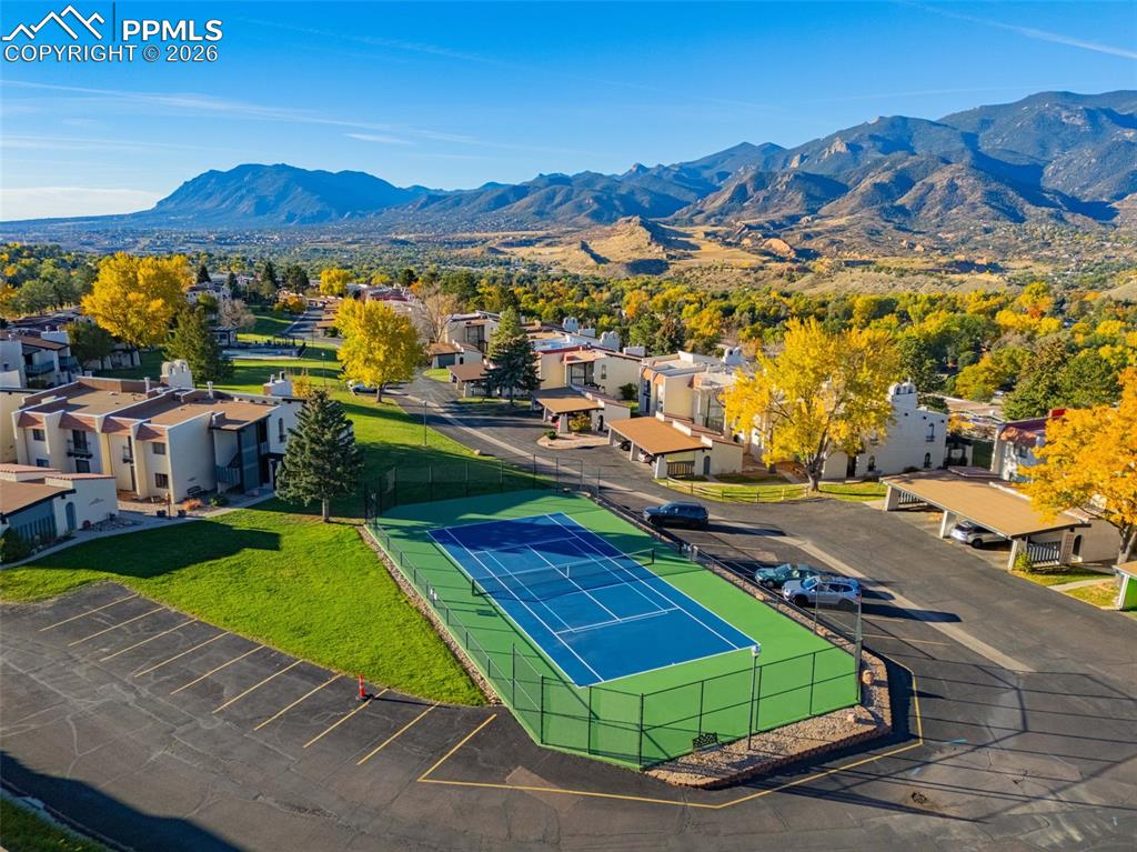 1018 Fontmore Road, Unit C Colorado Springs, CO 80904 - Photo 23 of 29 Aerial perspective of suburban area featuring a mountain backdrop
