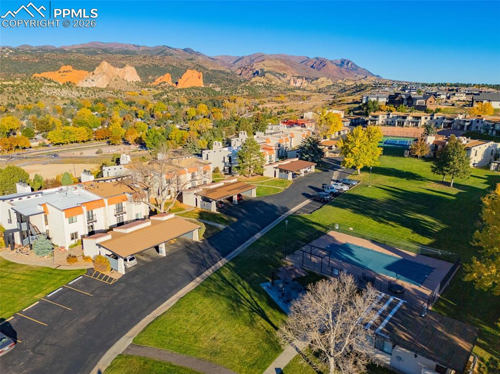 1018 Fontmore Road, Unit C Colorado Springs, CO 80904 - Photo 26 of 29 Aerial perspective of suburban area featuring a mountain backdrop