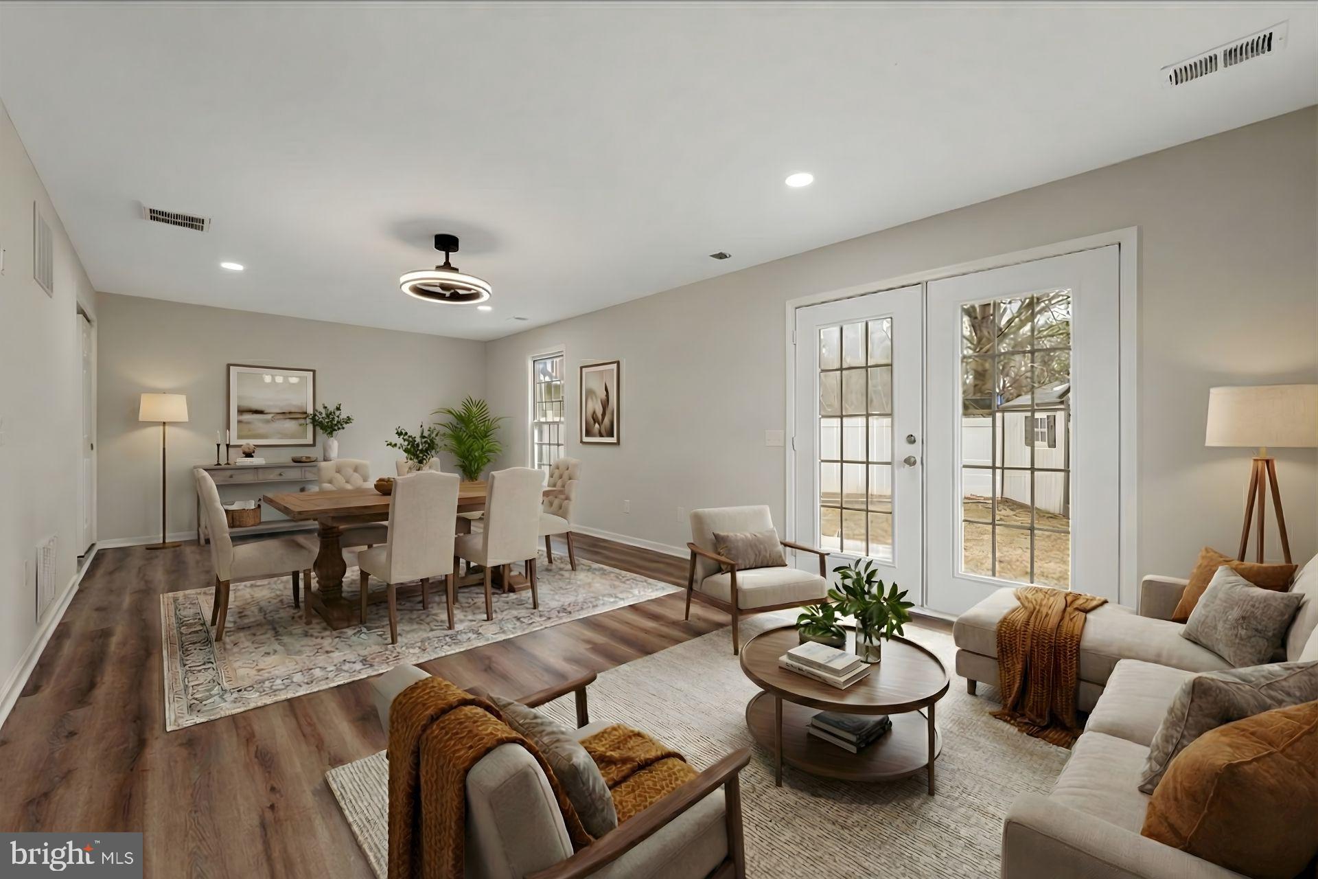 7931 Russell Road Alexandria, VA 22309 - Photo 2 of 16 a living room with furniture and a large window