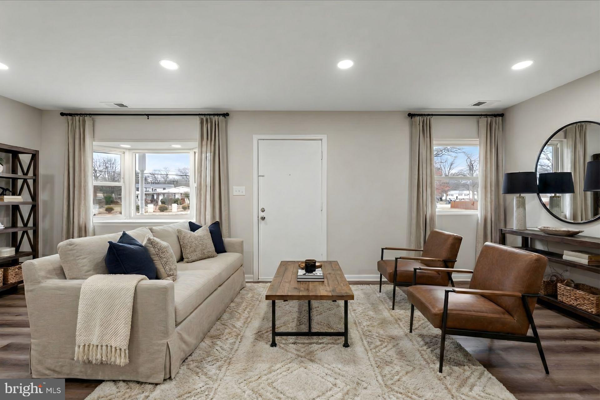 7931 Russell Road Alexandria, VA 22309 - Photo 6 of 16 a living room with furniture and a large window
