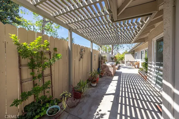 a view of a patio with potted plants