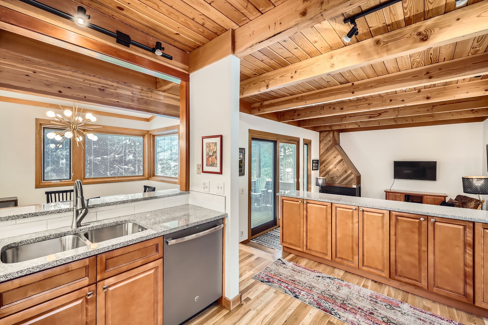 440 Tennis Club Road, Unit 1321 Keystone, CO 80435 - Photo 4 of 42 The kitchen offers stunning views, a design that makes it easy to chat with guests, and ample cabinetry for enhanced functionality and storage