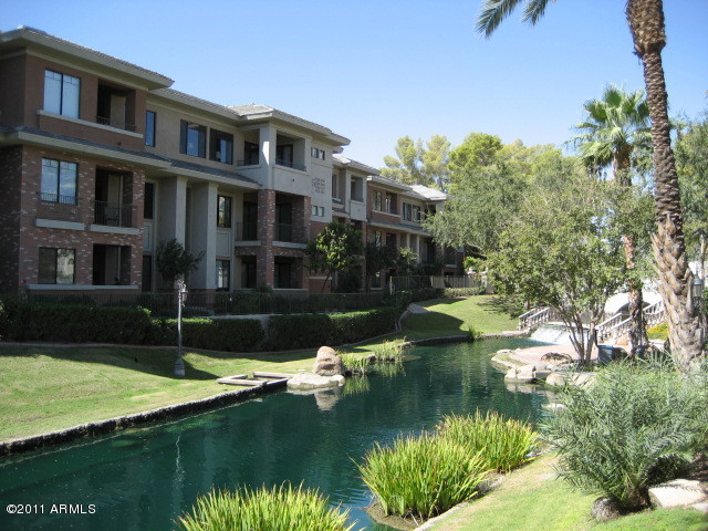 4488 East Thomas Road, Unit 1044 Phoenix, AZ 85018 - Photo 3 of 31 a house with river in front of it
