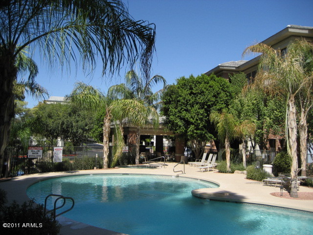 4488 East Thomas Road, Unit 1044 Phoenix, AZ 85018 - Photo 10 of 31 front view of a building with a garden