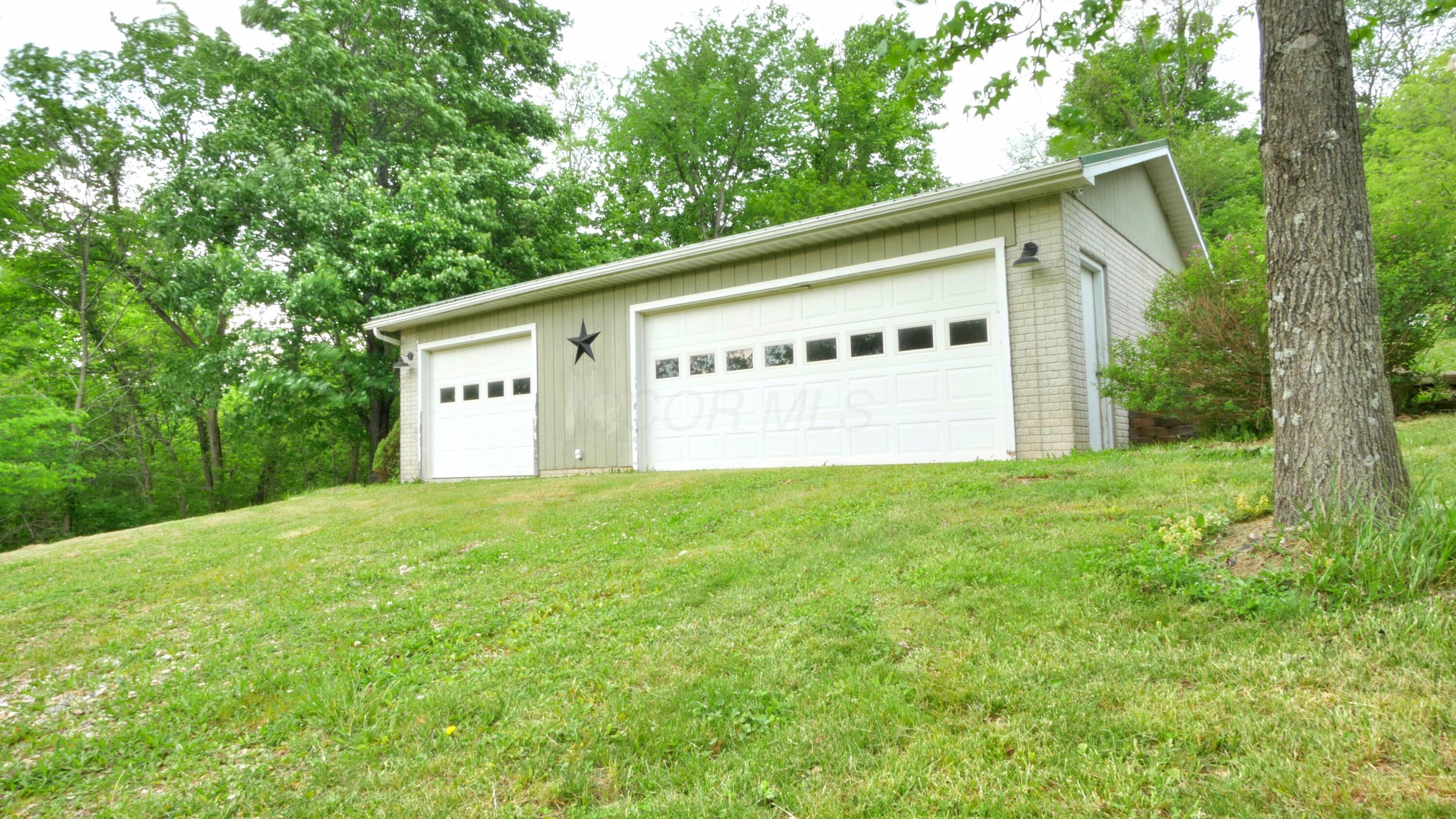 750 Upper Douda Road Malta, OH 43758 - Photo 26 of 44 3 car Garage