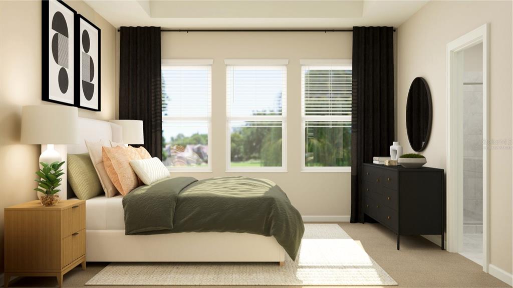 10262 Hadley Street Orlando, FL 32829 - Photo 13 of 19 a bedroom with a bed and a large window