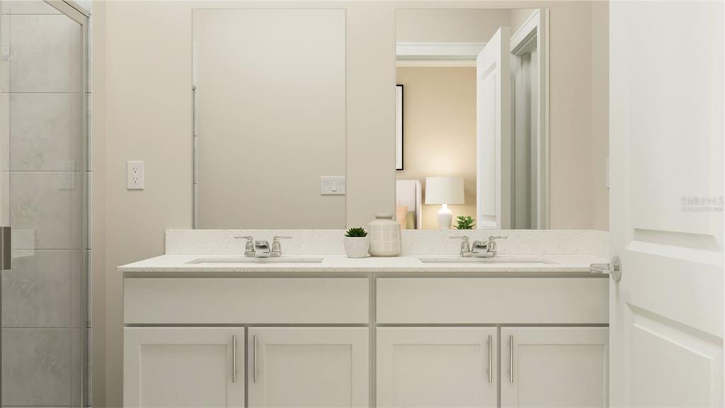 10262 Hadley Street Orlando, FL 32829 - Photo 14 of 19 a bathroom with a sink and a mirror