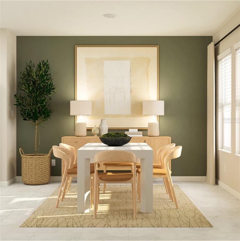 10262 Hadley Street Orlando, FL 32829 - Photo 5 of 19 a view of a dining room with furniture and wooden floor