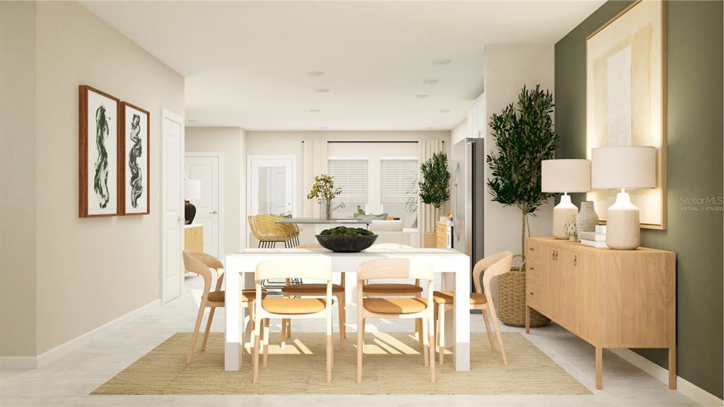 10262 Hadley Street Orlando, FL 32829 - Photo 7 of 19 a view of a dining room with furniture and chandelier