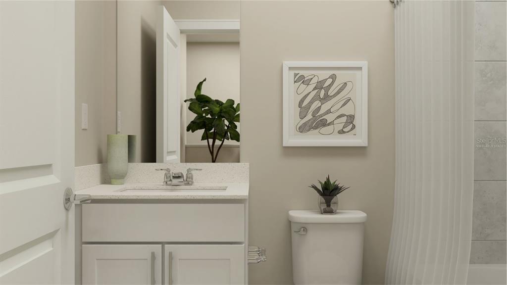 10262 Hadley Street Orlando, FL 32829 - Photo 8 of 19 a bathroom with a sink and a mirror