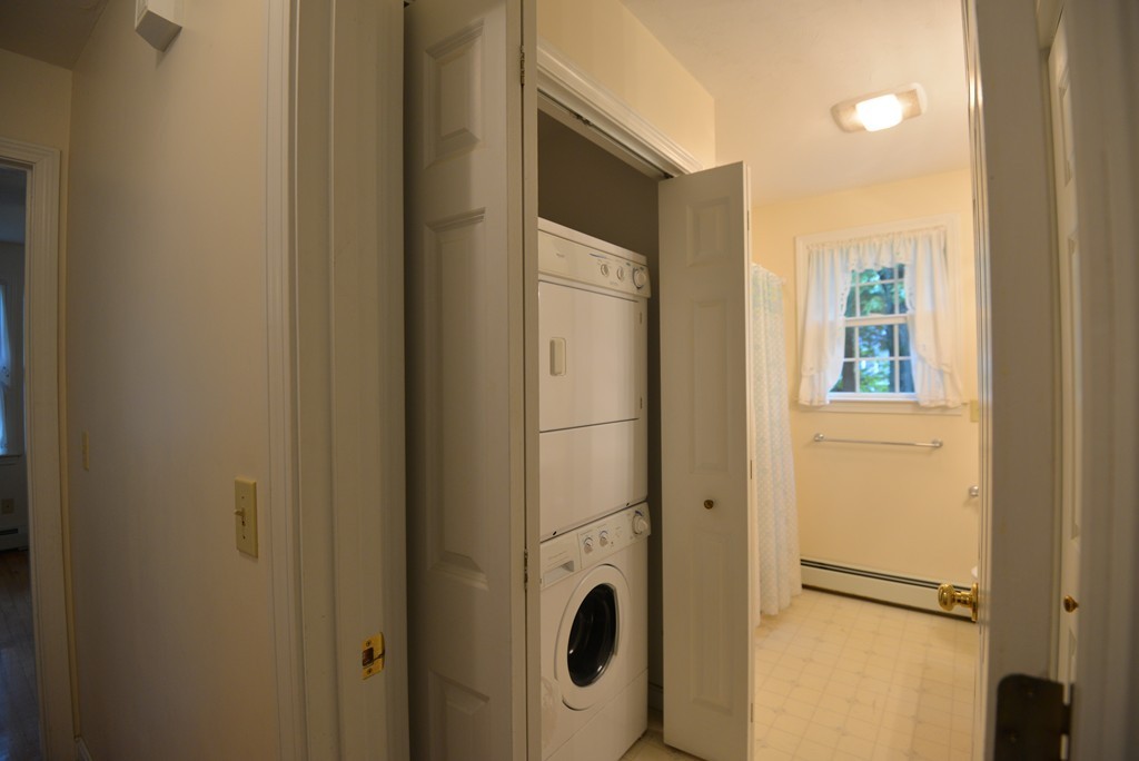 79 Converse Road Marion, MA 02738 - Photo 12 of 13 a view of a hallway with windows and closet