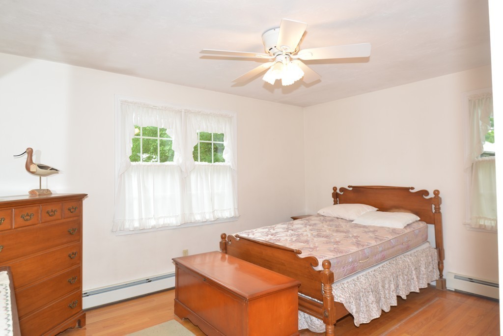 79 Converse Road Marion, MA 02738 - Photo 7 of 13 a bedroom with a bed and window