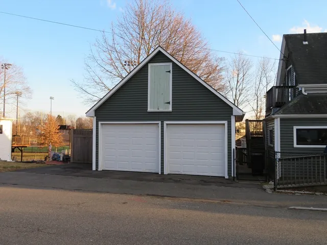 a front view of a house with garage