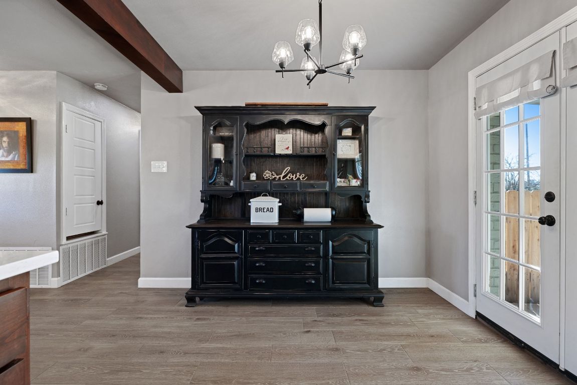301 North 8th Street Jarrell, TX 76537 - Photo 16 of 27 a view of a big room with chandelier
