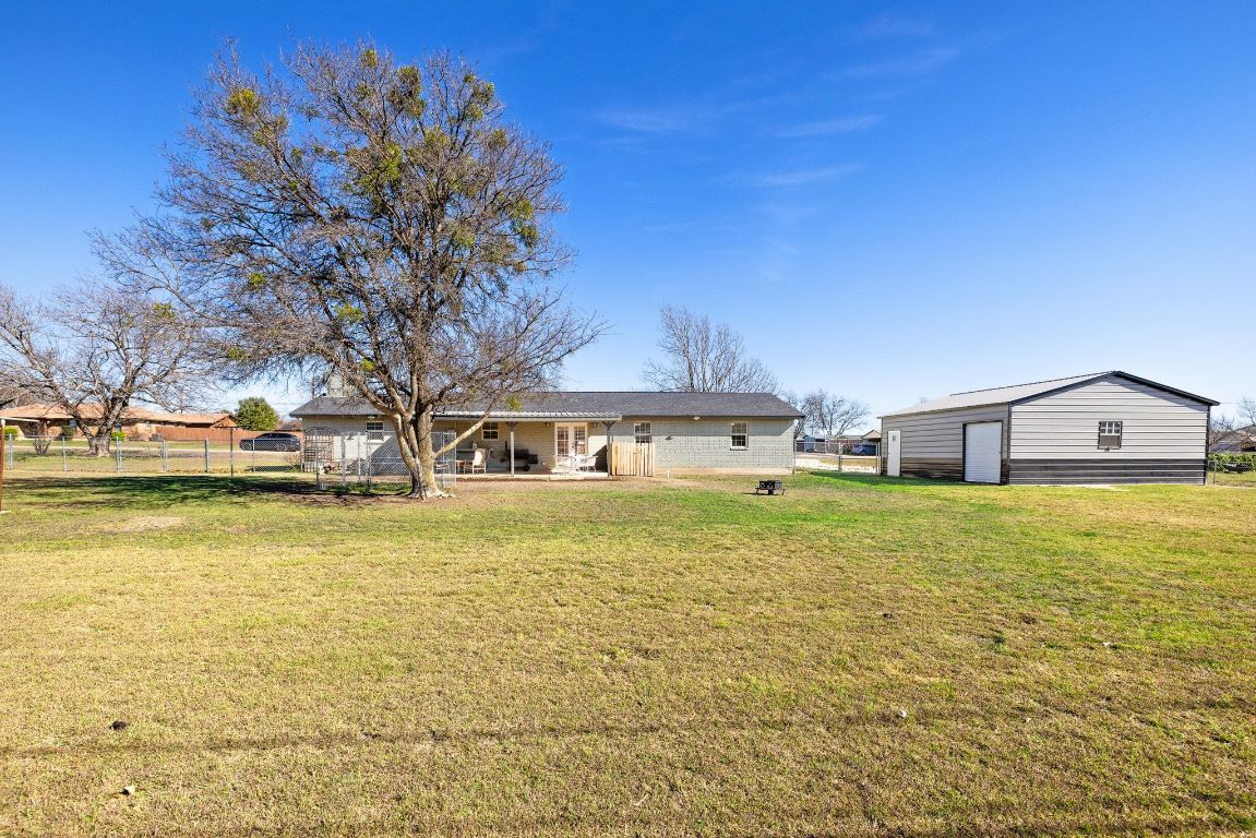301 North 8th Street Jarrell, TX 76537 - Photo 27 of 27 a front view of a building with garden