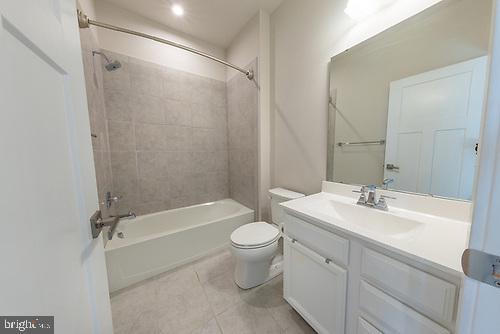 272 Sugar Maple Square Downingtown, PA 19335 - Photo 35 of 41 a bathroom with a sink a toilet and shower