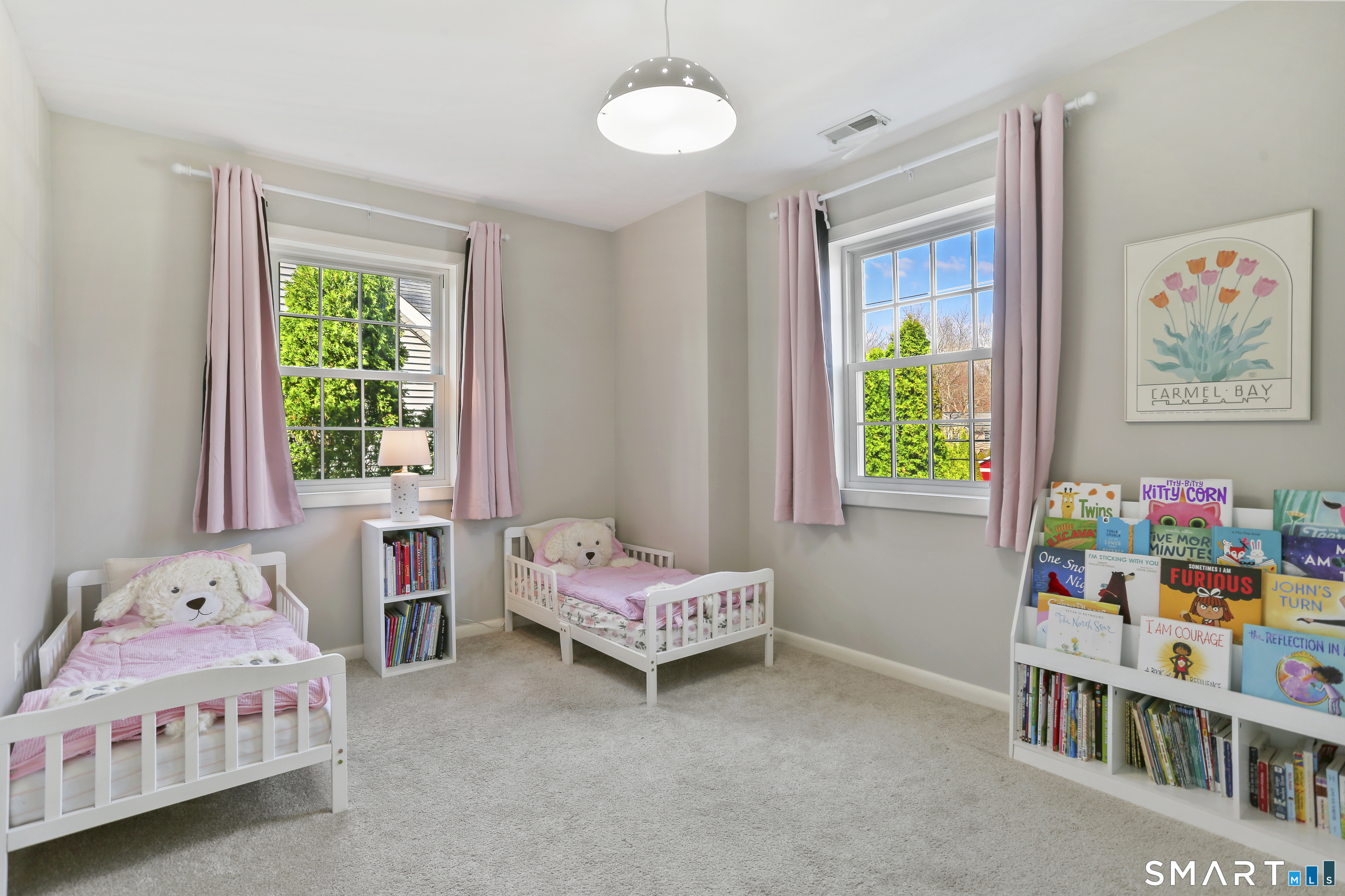 185 Windsor Road Fairfield, CT 06824 - Photo 26 of 41 a bedroom with a bed and a window