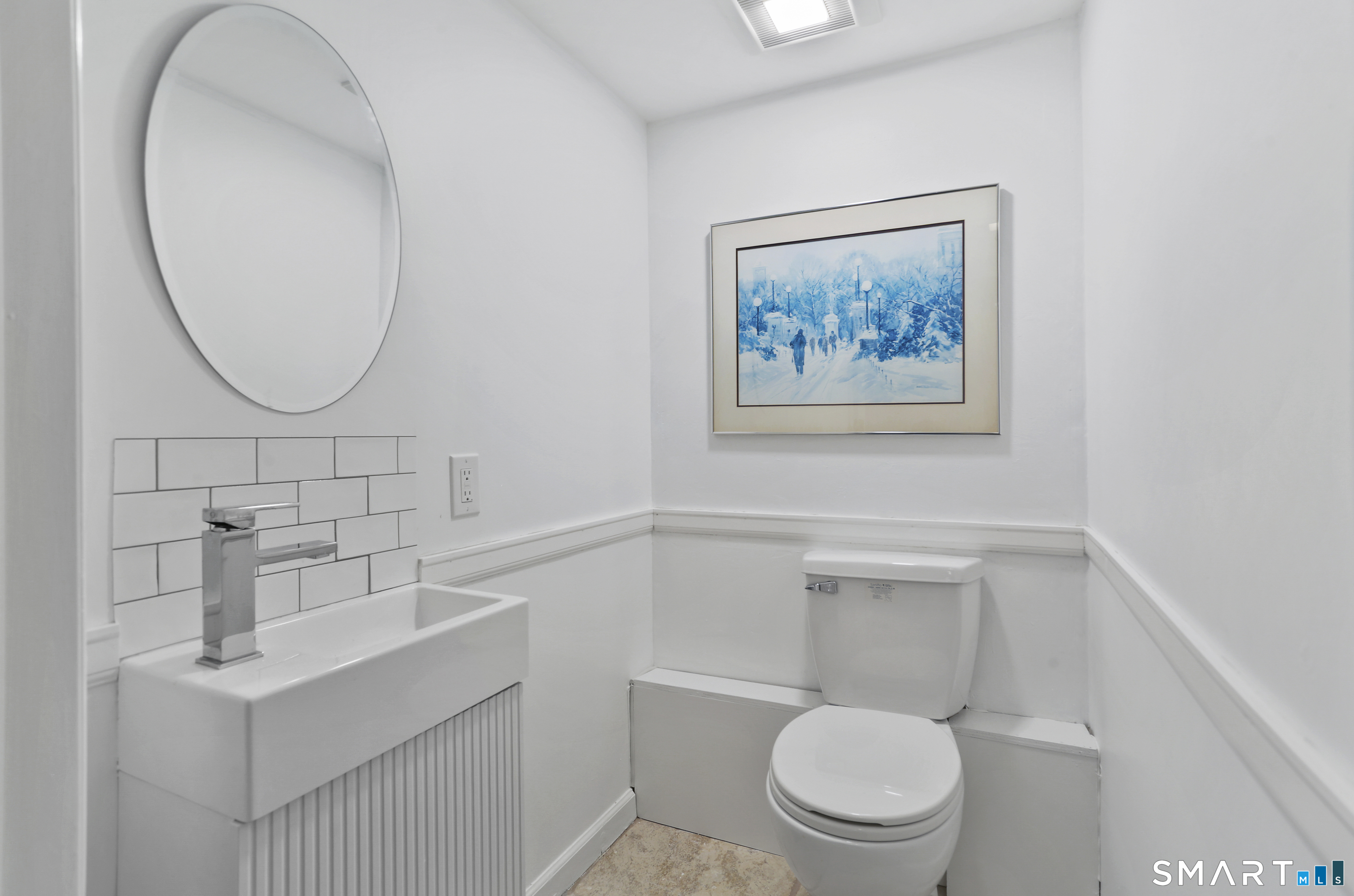 185 Windsor Road Fairfield, CT 06824 - Photo 29 of 41 a bathroom with a toilet a sink and a mirror