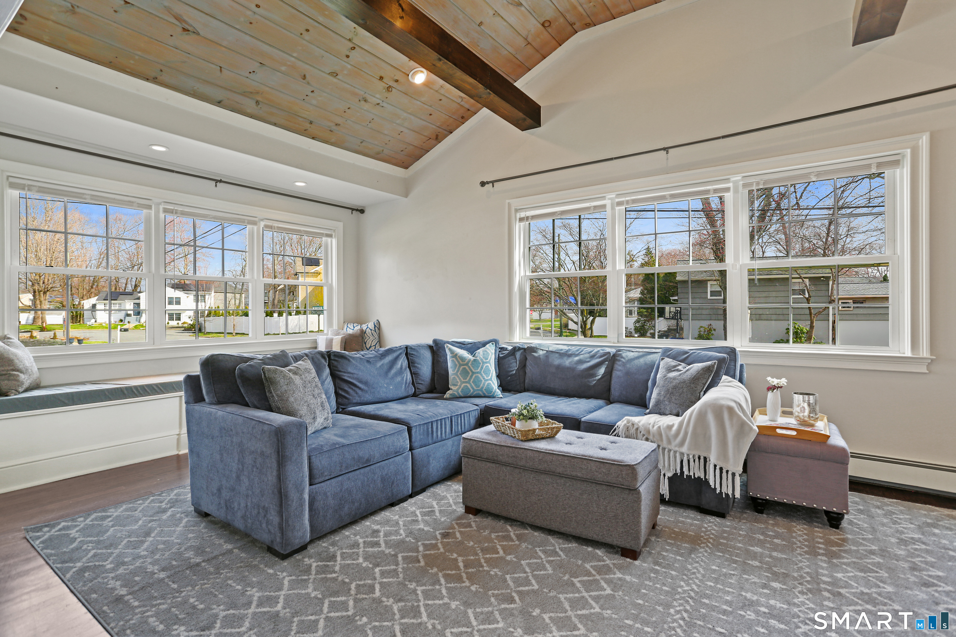 185 Windsor Road Fairfield, CT 06824 - Photo 10 of 41 a living room with furniture and a large window