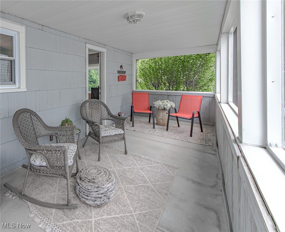 695 Ecton Road Akron, OH 44303 - Photo 20 of 26 The screened porch is a welcome addition to this home, additional square footage of exterior living, serving as a haven for relaxation and rejuvenation. Three seasons a year, you can spend time outdoors, taking in the fresh air and sights and sounds of nature. With some personal touches, such as string lights or a ceiling fan, you can transform this space into a sanctuary that reflects your tastes and offers a haven where you can unwind and de-stress.