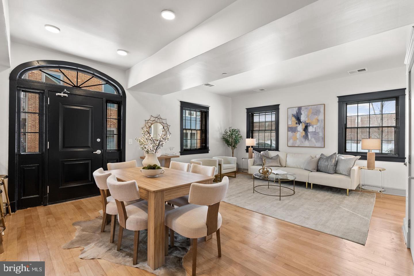 The stately door adds architectural character.