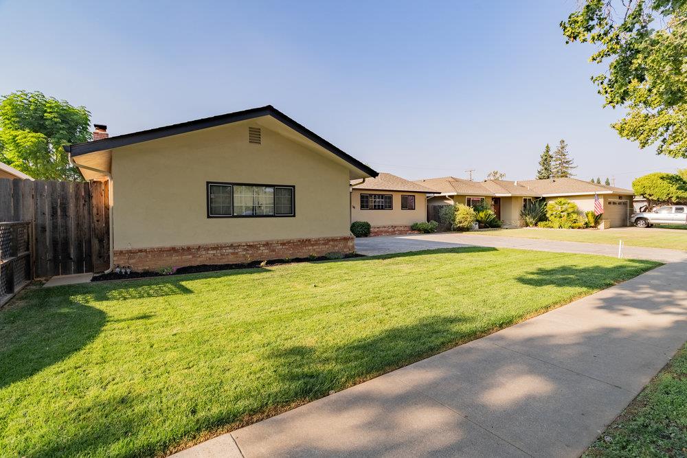 741 West 6th Street Gilroy, CA 95020 - Photo 2 of 29 a front view of house with yard and trees around