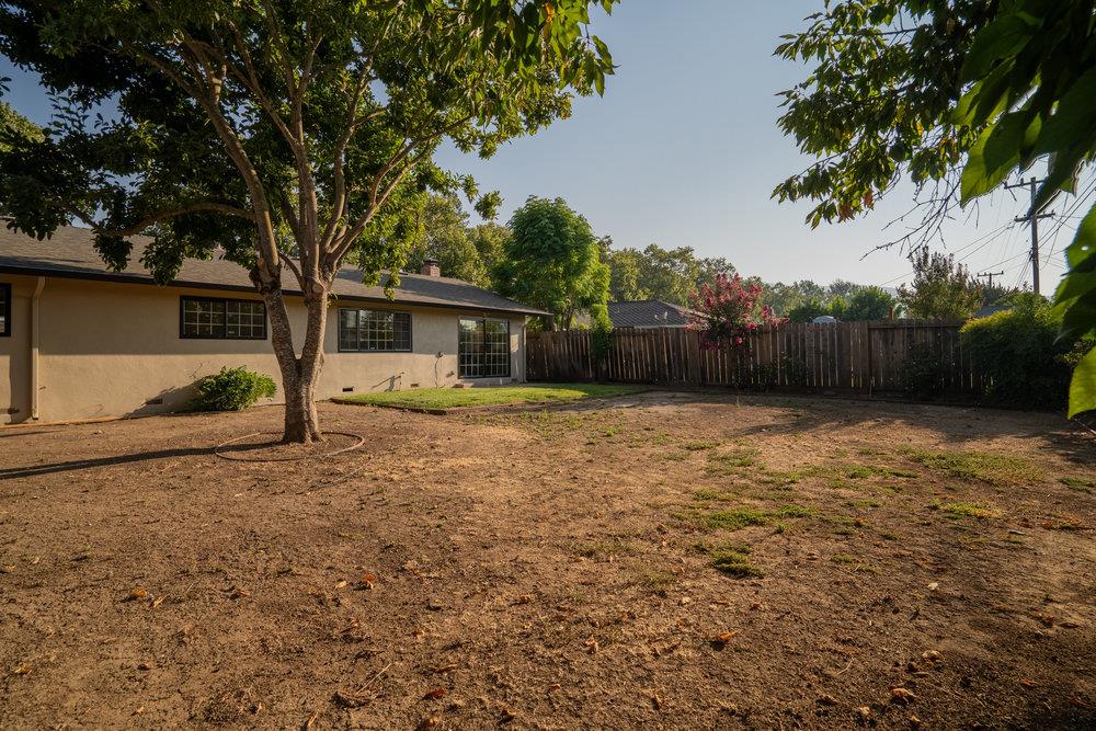 741 West 6th Street Gilroy, CA 95020 - Photo 28 of 29 a backyard of a house with lots of green space