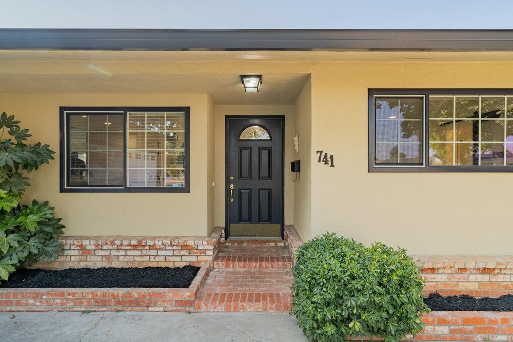 741 West 6th Street Gilroy, CA 95020 - Photo 3 of 29 a front view of a house with a yard