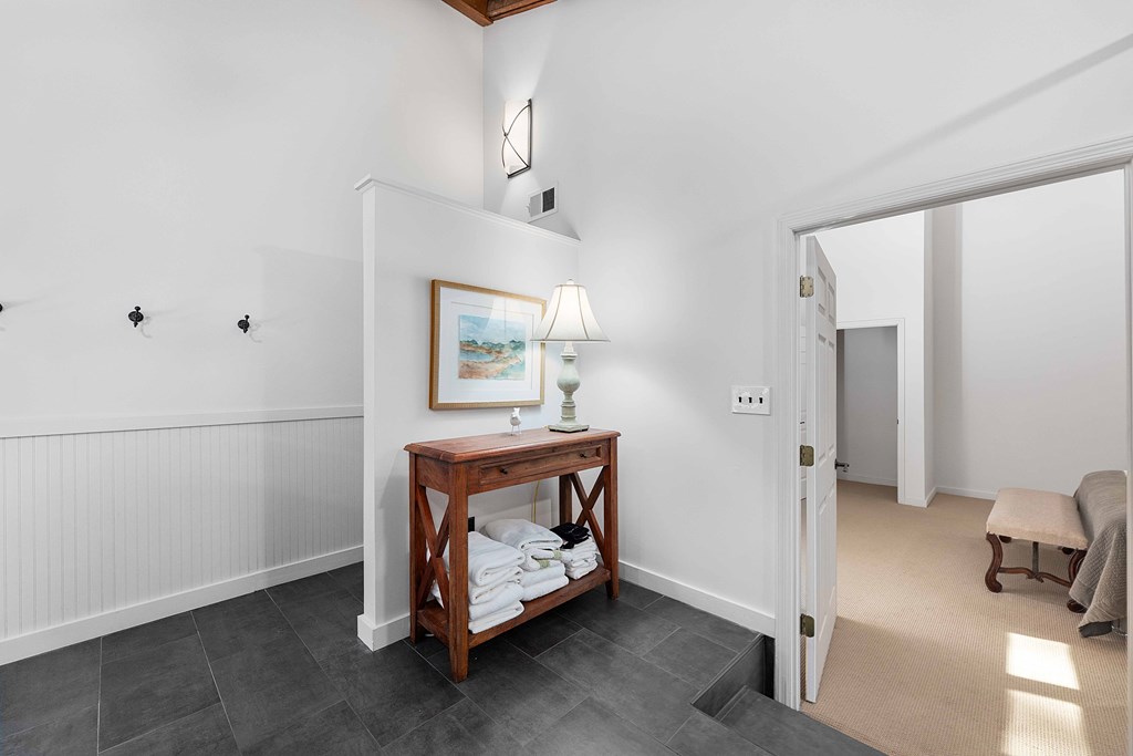 94 Hidden Trail Hamilton, GA 31811 - Photo 19 of 46 a room with a bed and a mirror