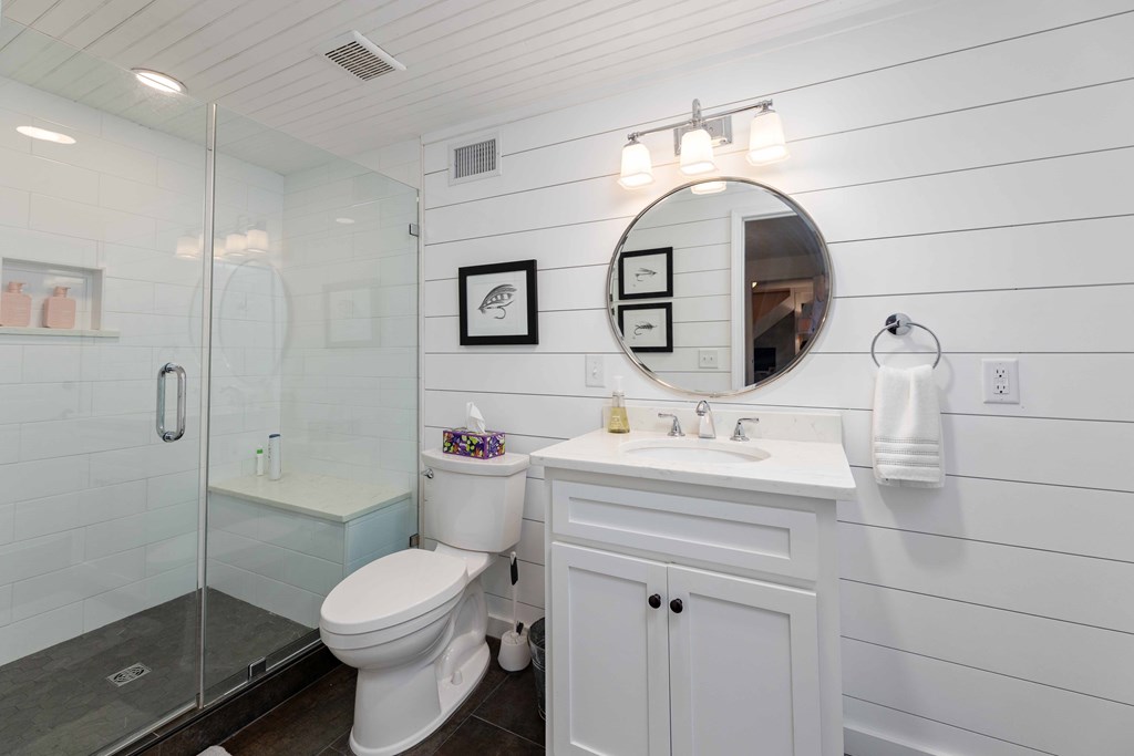 94 Hidden Trail Hamilton, GA 31811 - Photo 25 of 46 a bathroom with a sink toilet and shower