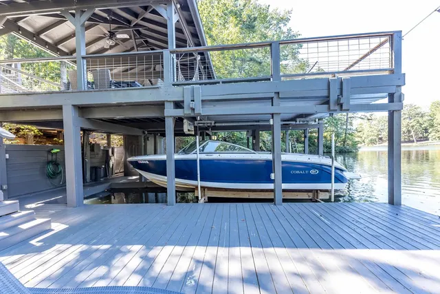 a view of a porch with wooden floor