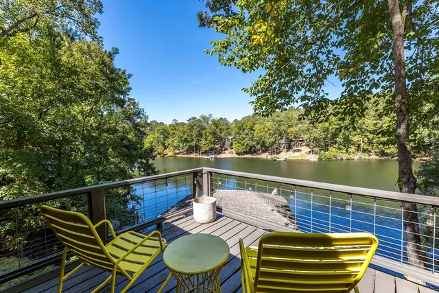 a dinning table and chairs in patio of the house