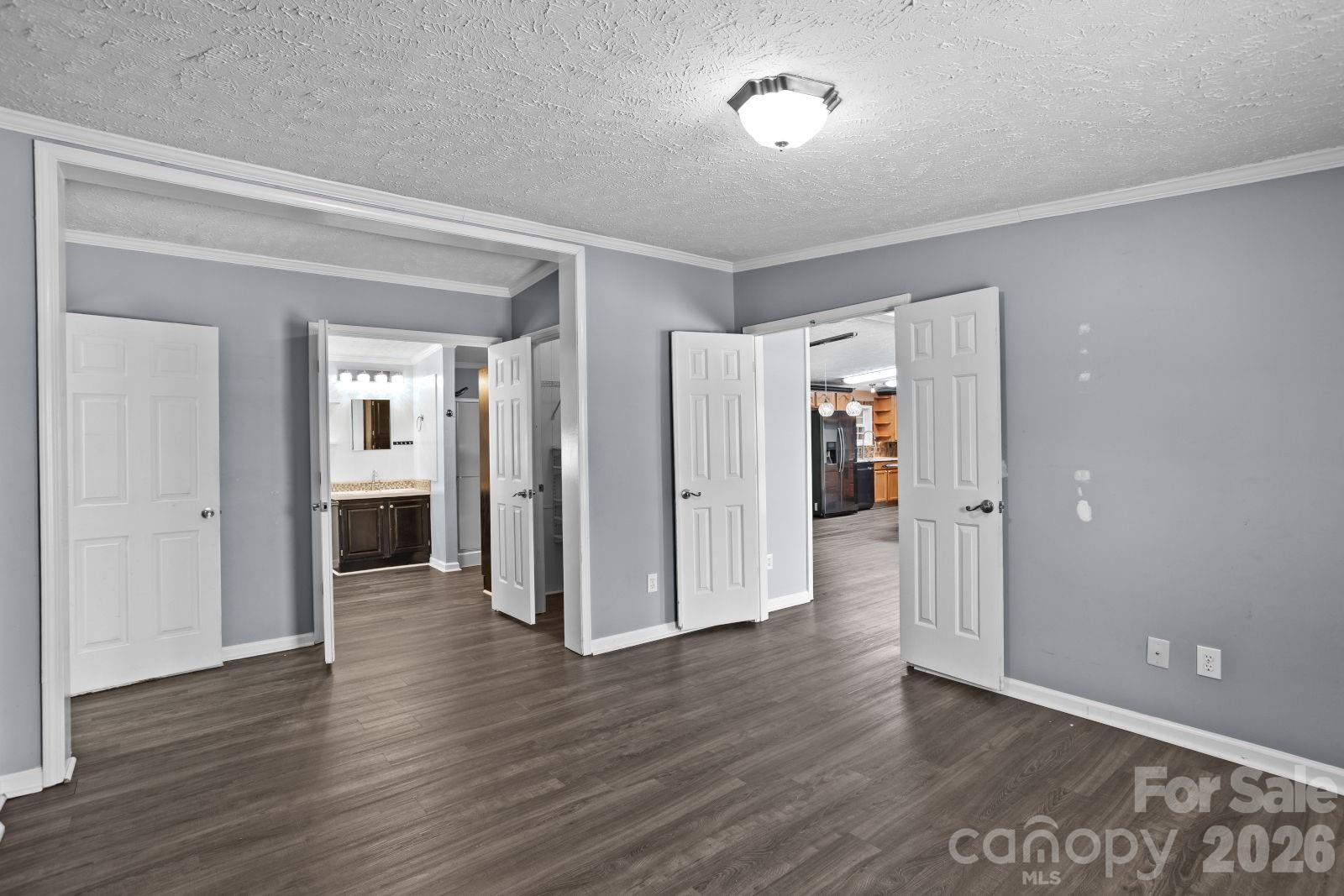 4855 Talley Road Walkertown, NC 27051 - Photo 21 of 45 a view of a hallway with wooden floor