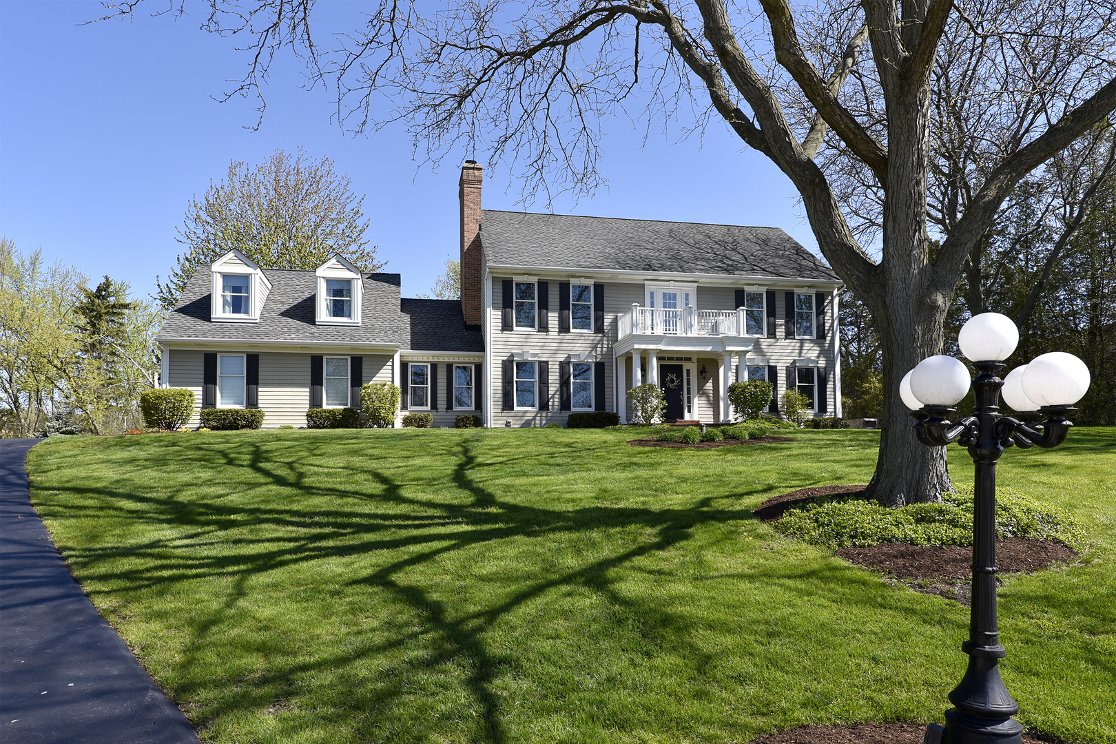 778 Summer Isle Lane Inverness, IL 60010 - Photo 1 of 1 a front view of a house with a yard table and chairs
