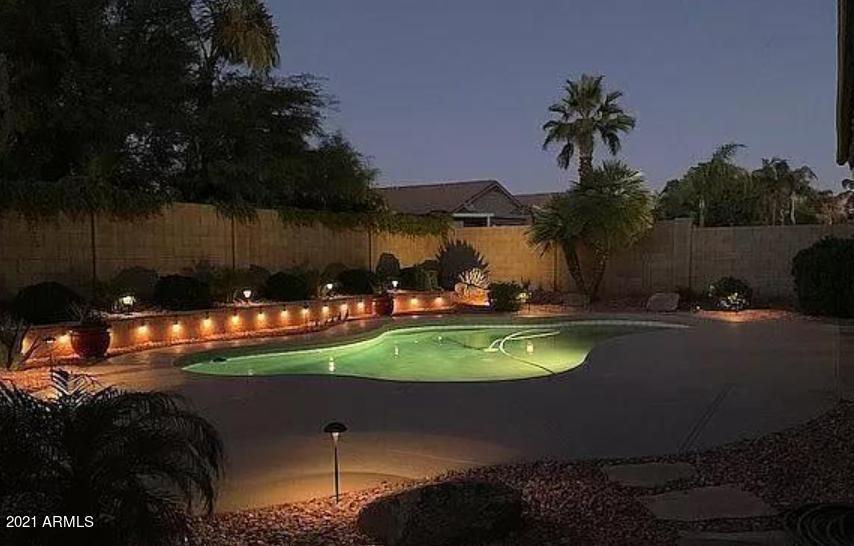 4358 East Briles Road Phoenix, AZ 85050 - Photo 20 of 21 Pool Night