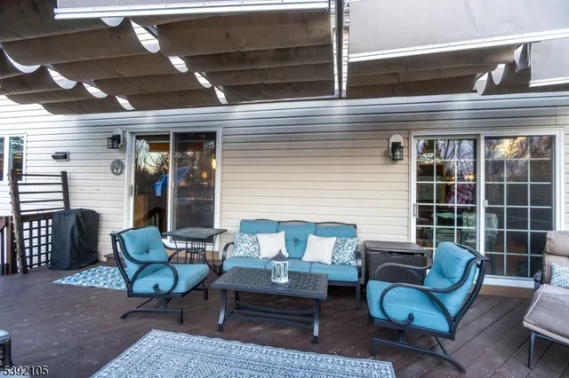 a outdoor living space with furniture and a potted plant