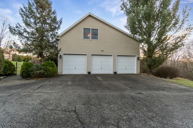 a view of garage and yard