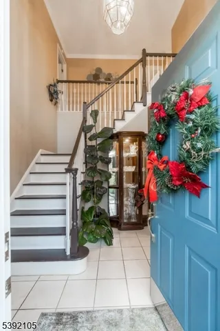 a view of entryway with flower pots