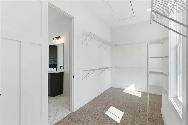a view of hallway with wooden floor