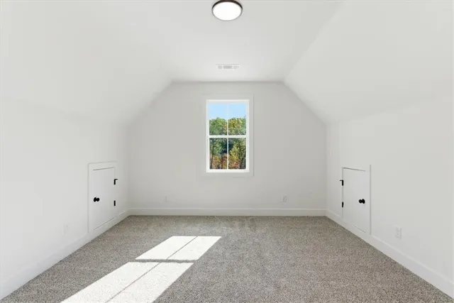 an empty room with window