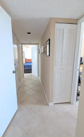 a view of empty room with a fireplace