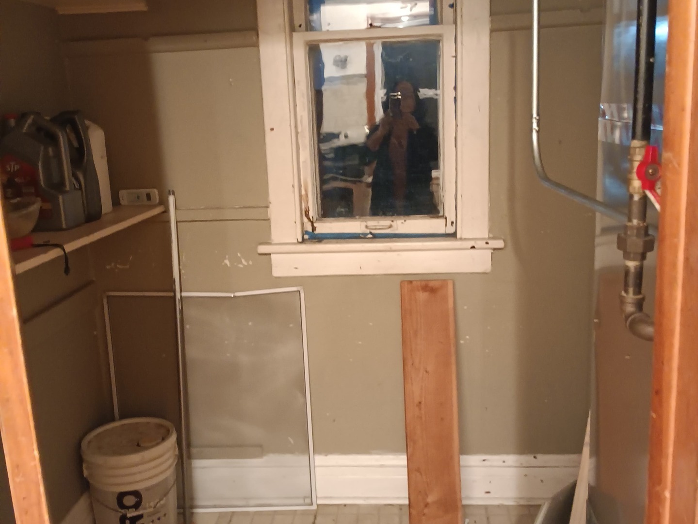 4846 South Pulaski Road, Unit 2 Chicago, IL 60632 - Photo 2 of 9 a bathroom with a window and a shower