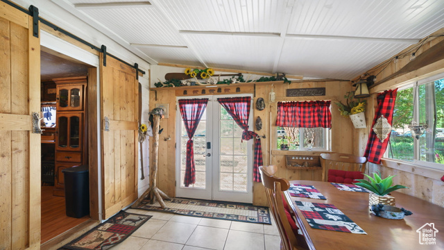 180 North State Street Sigurd, UT 84657 - Photo 17 of 32 Sunroom with a barn door, lofted ceiling, and french doors