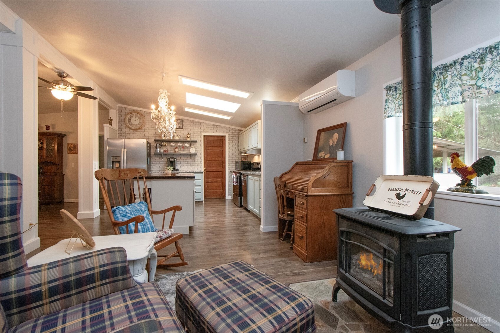 141 Lavender Ridge Lane Sequim, WA 98382 - Photo 12 of 40 a living room with furniture and a fireplace