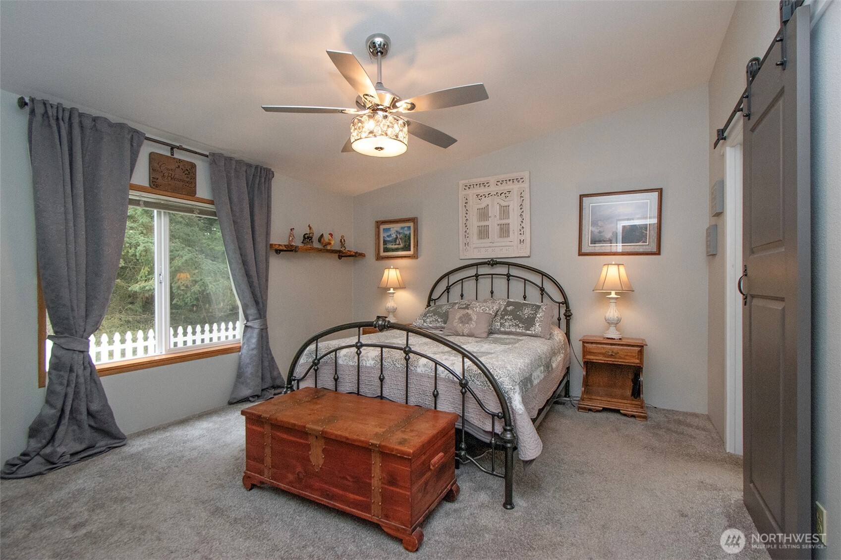 141 Lavender Ridge Lane Sequim, WA 98382 - Photo 19 of 40 a bedroom with a bed and a window