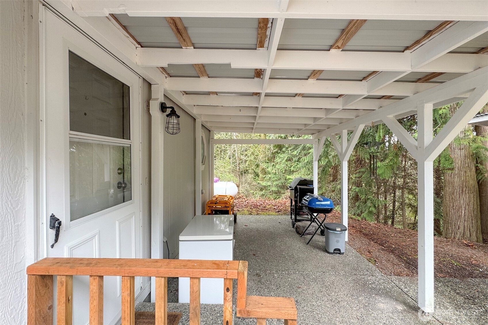 141 Lavender Ridge Lane Sequim, WA 98382 - Photo 29 of 40 a view of a porch with furniture