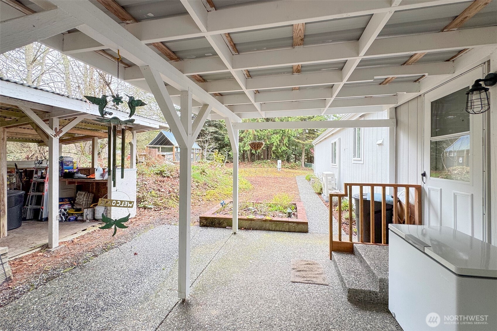 141 Lavender Ridge Lane Sequim, WA 98382 - Photo 30 of 40 a view of a porch with furniture