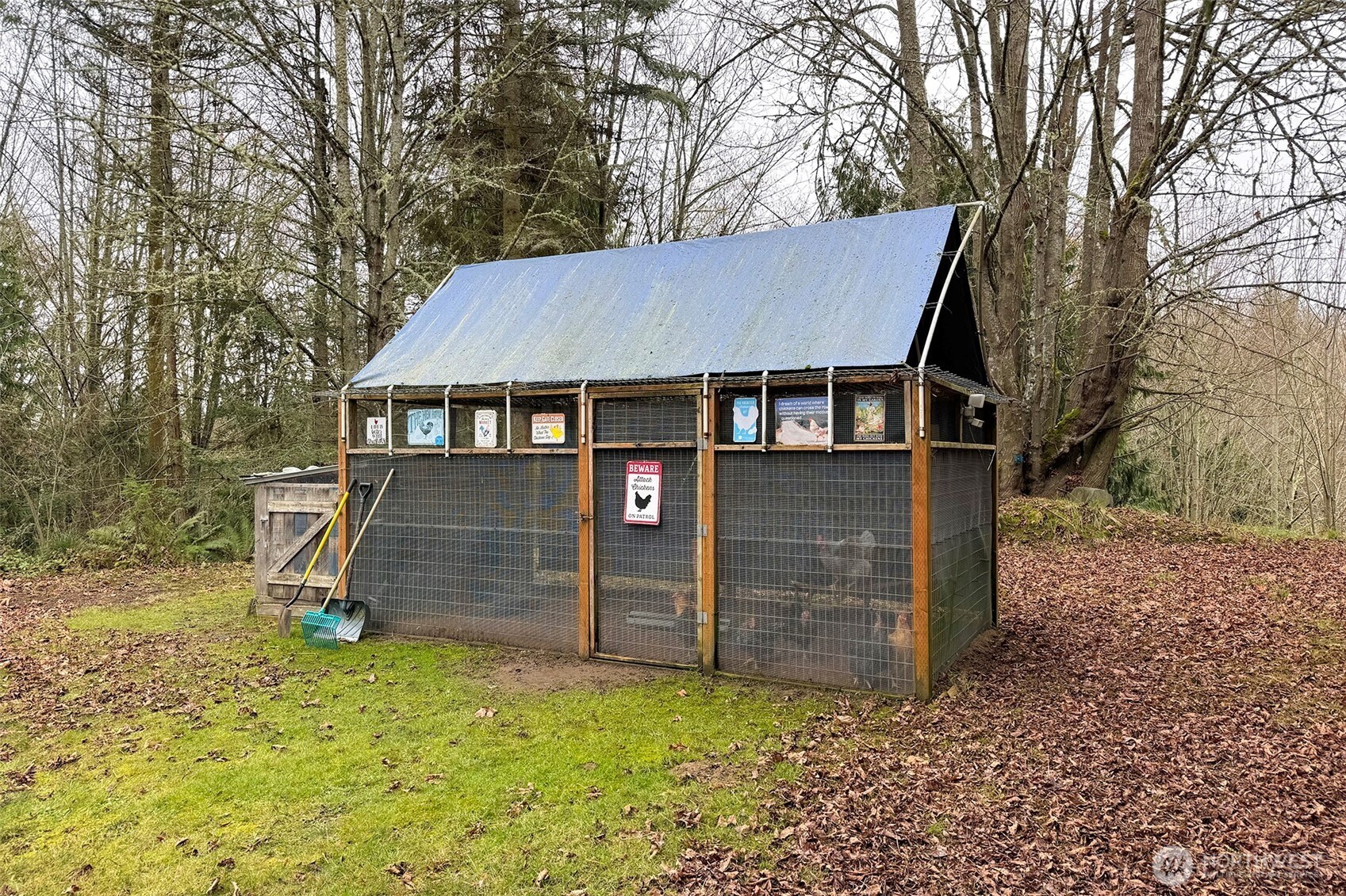 141 Lavender Ridge Lane Sequim, WA 98382 - Photo 31 of 40 a view of a house with a yard