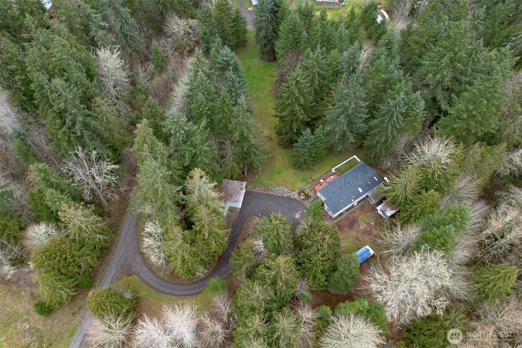 141 Lavender Ridge Lane Sequim, WA 98382 - Photo 39 of 40 an aerial view of a house with a yard